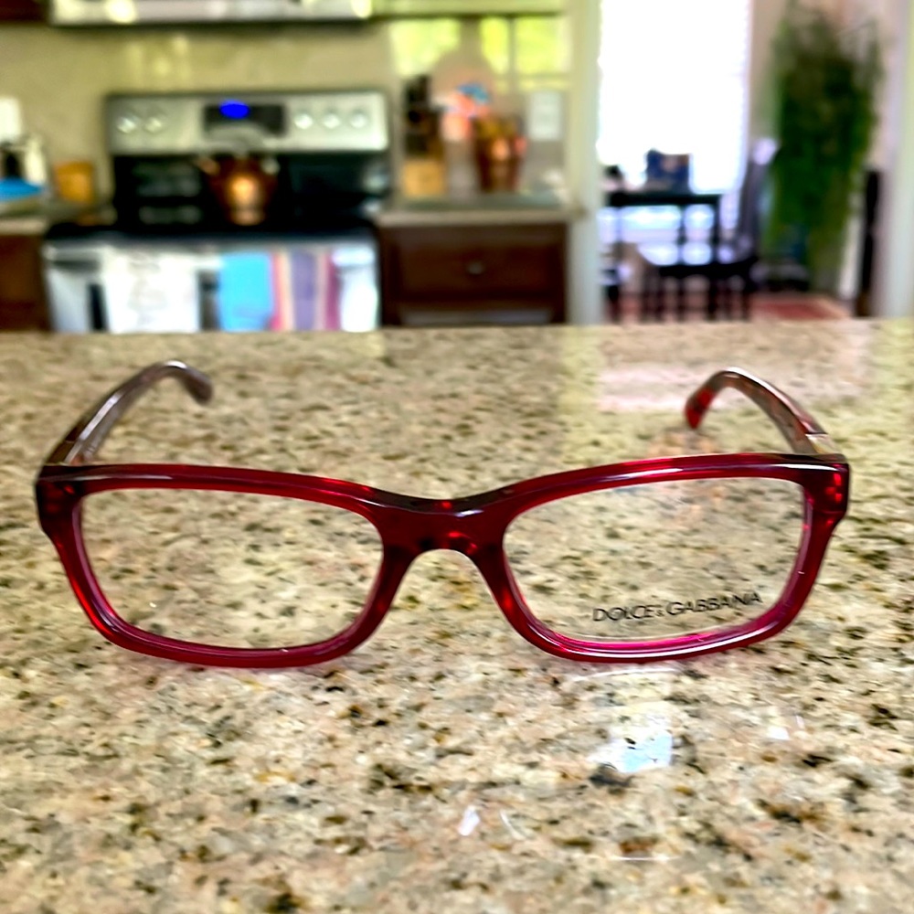 Dolce Gabbana rich red eyeglass frames. Never been worn. Beautiful detail arms.